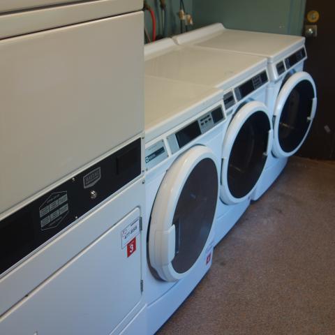 Taplin House Laundry Room with washing and drying machines