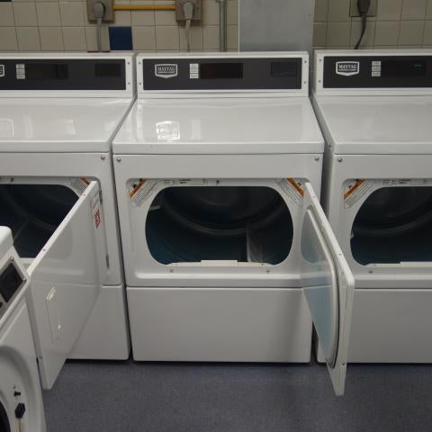Sherman House Laundry Room with washing and drying machines