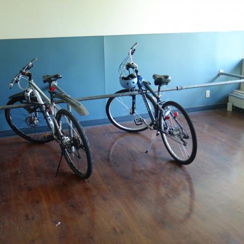 Sherman House Indoor Bike Room with bike racks & two bikes