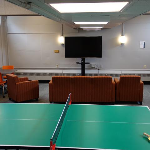 Michelson House Basement Lounge showing ping pong table, furniture and television