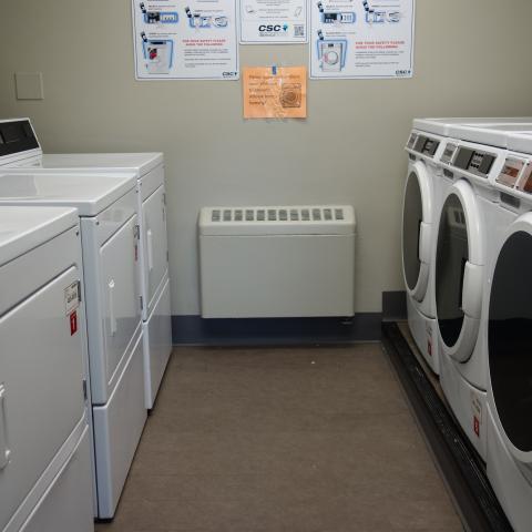 Howe House 1st Floor Laundry Room with washing and drying machines
