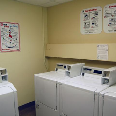 Storrs House Laundry Room with washing and drying machines