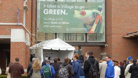 Village at E 115th with LEED sign