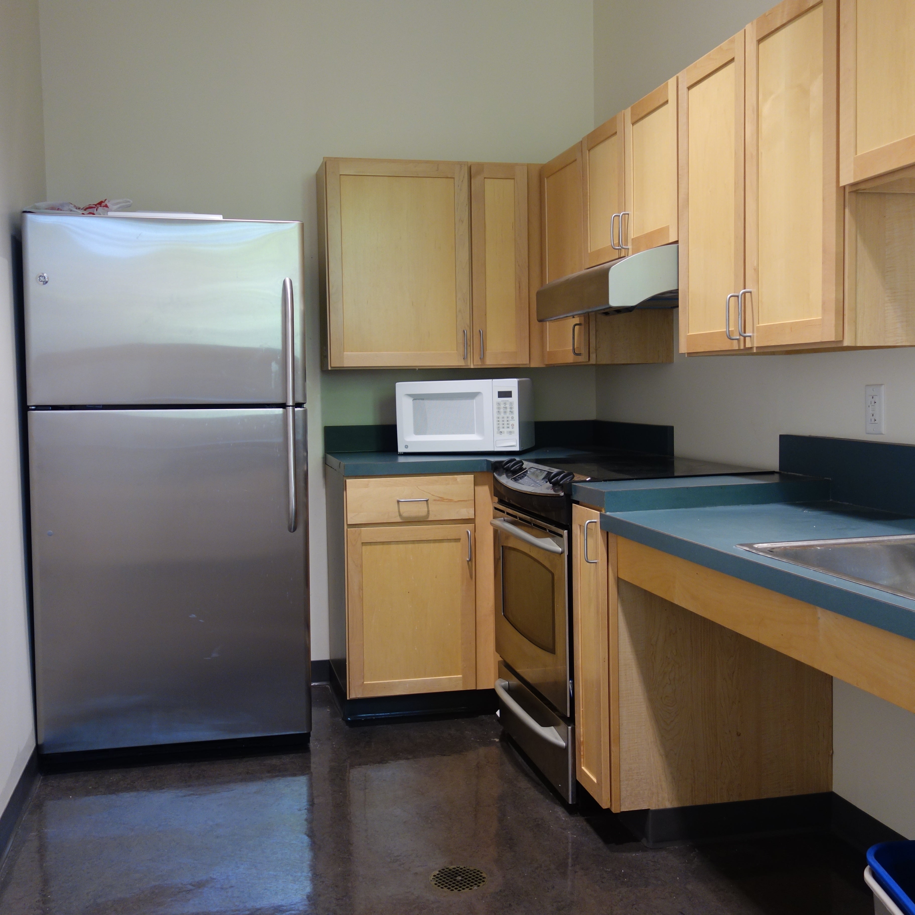 Village House 3 Kitchen with fridge, microwave, dishwasher, and sink