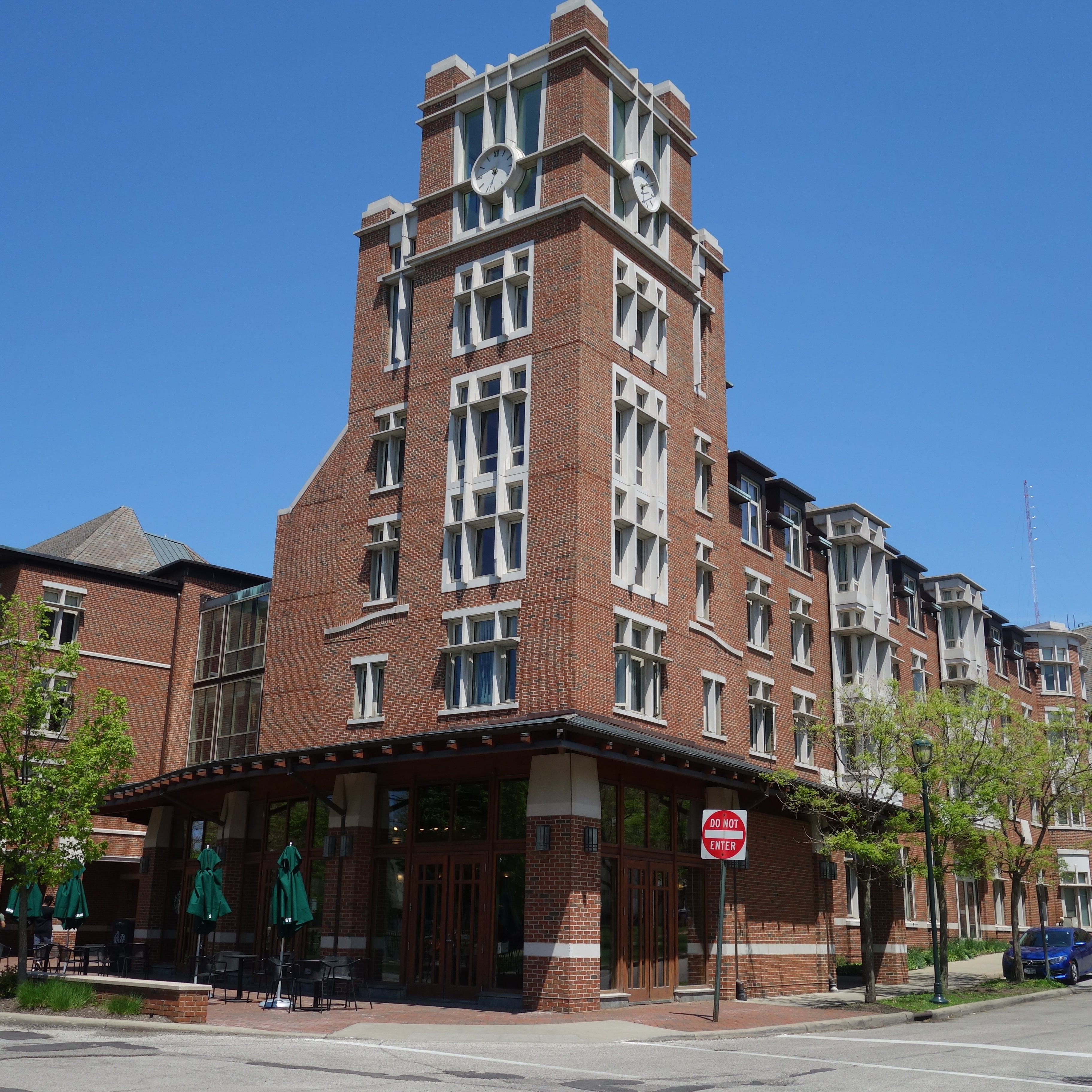 Village House 3A Exterior showing clock tower at corner of East 115th and 116th
