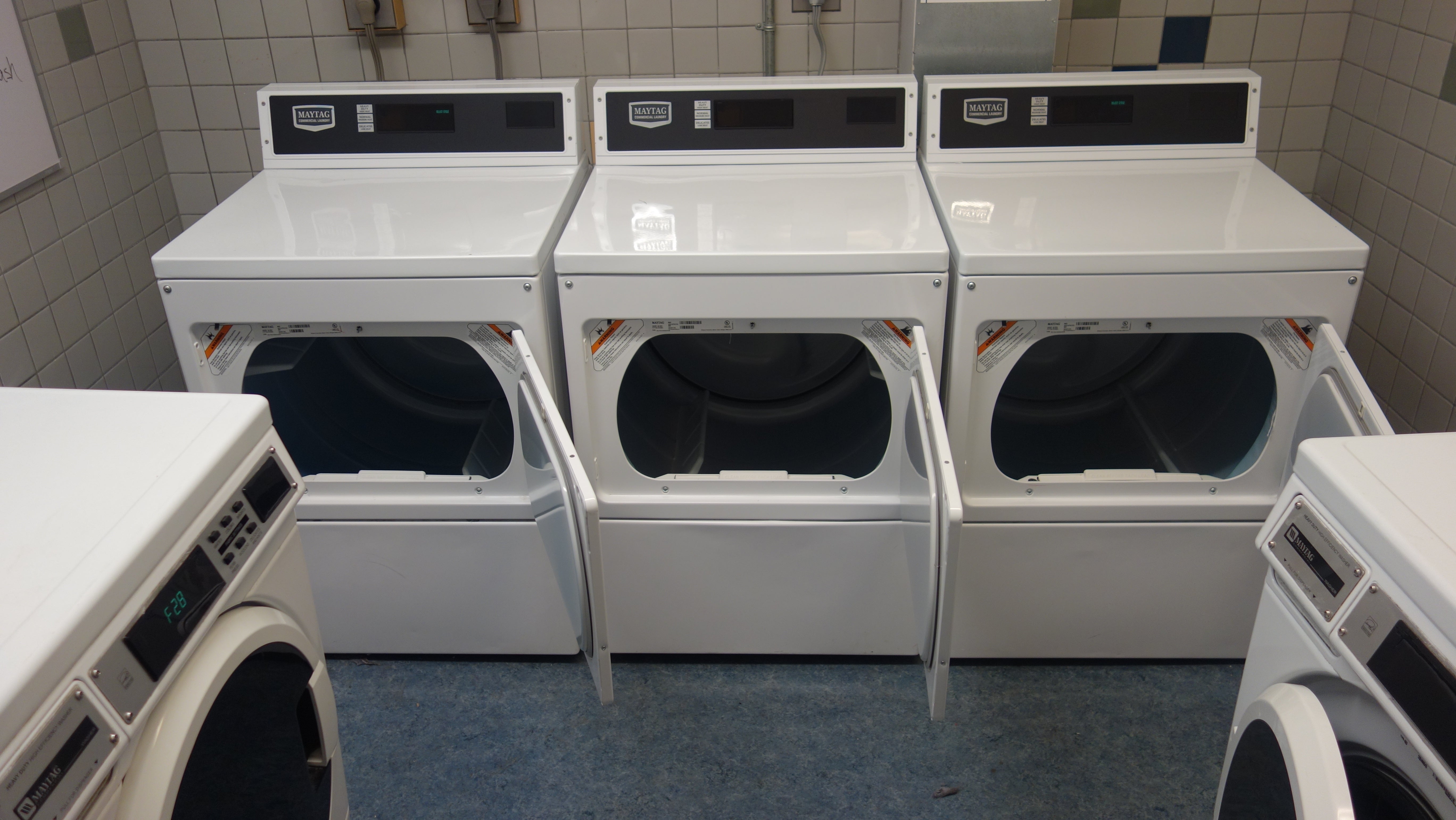 Norton House Laundry room with washing and drying machines