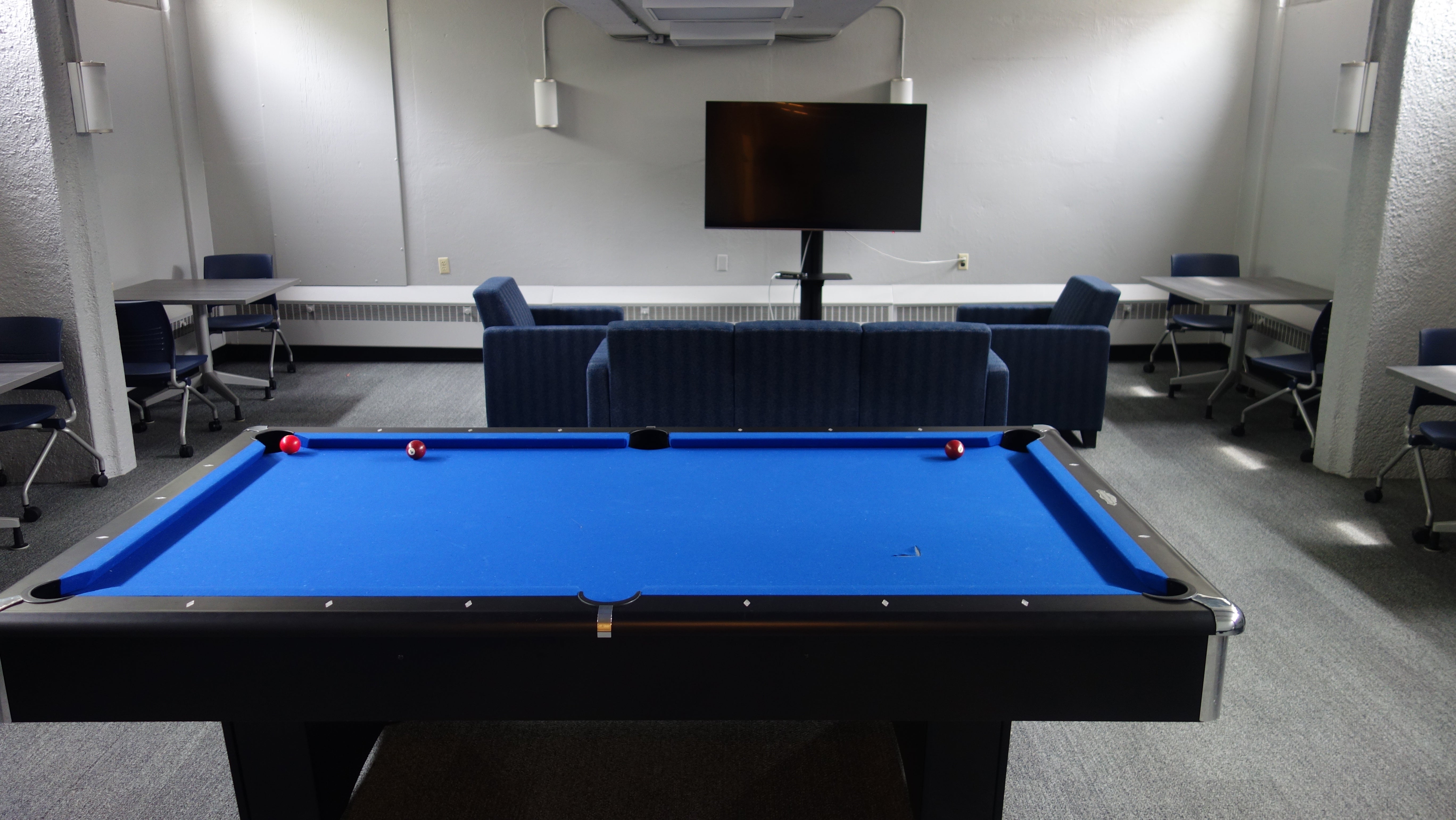 Kusch House Basement Lounge with pool table, furniture, and television