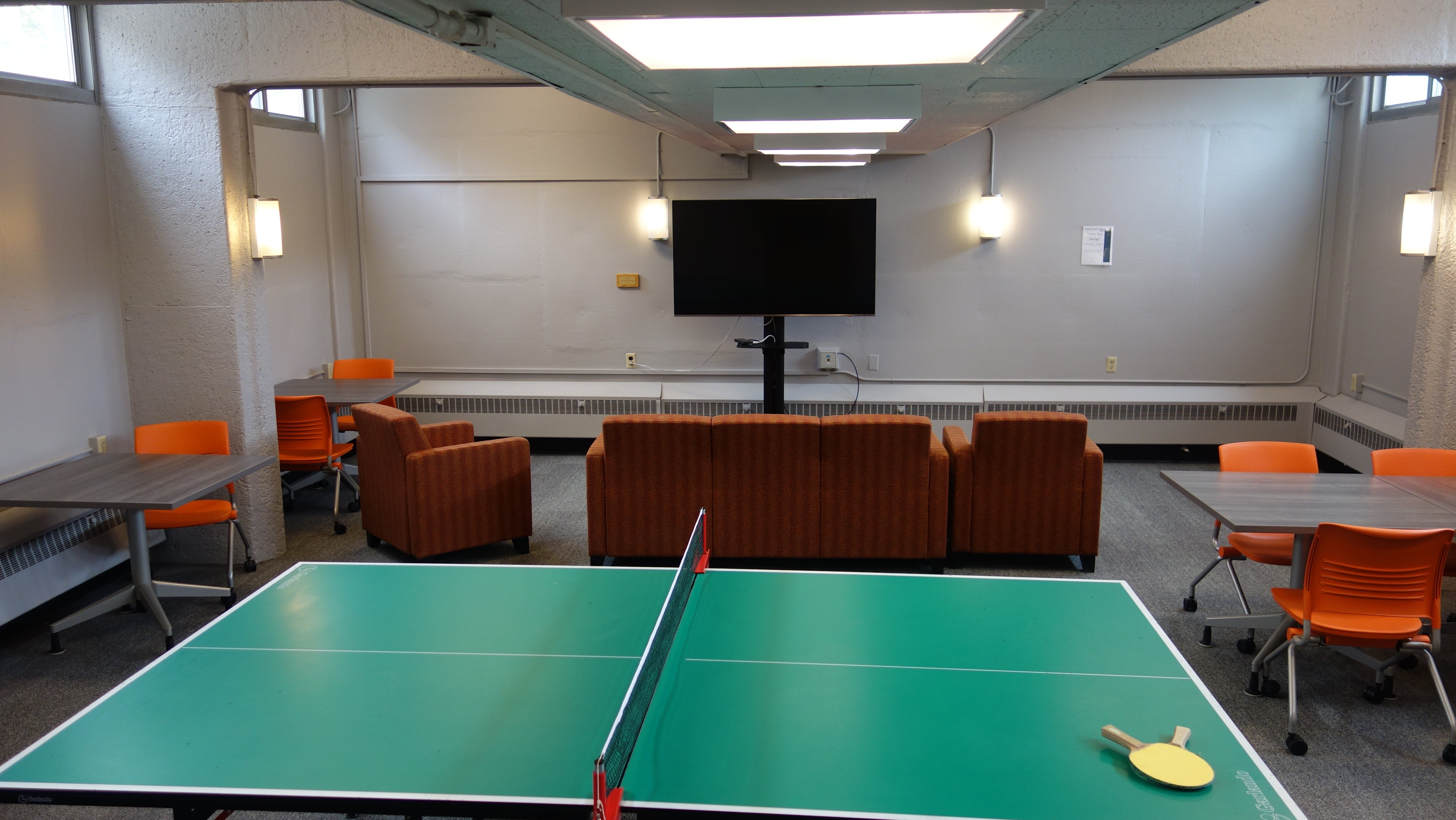 Michelson House Basement Lounge showing ping pong table, furniture and television