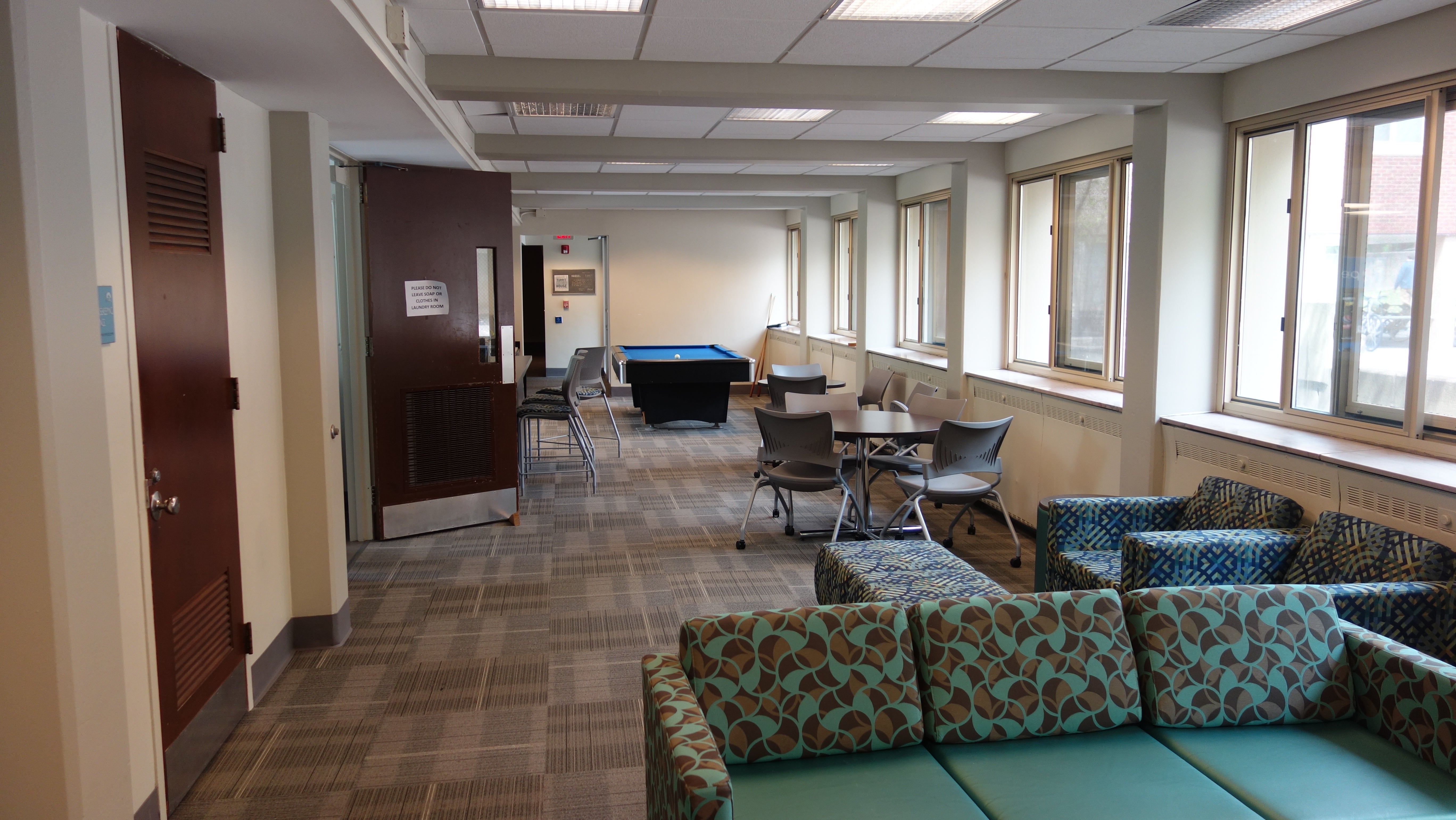 Tippit House Common Room showing furniture and game tables