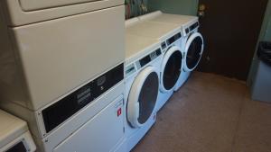 Taplin House Laundry Room with washing and drying machines