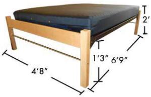 Full size bed with dimensions 6'-9" long, 2' tall, and 4'-8" wide, with 1'3" from floor to bed.