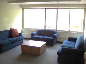 Pierce House Upper Floor Lounges with three couches and coffee table