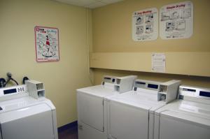 Storrs House Laundry Room with washing and drying machines