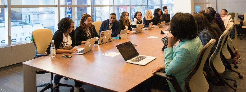 Staff Gathering in Conference Room