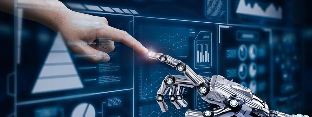 A human hand and robot hand touch fingers symbolizing a connection