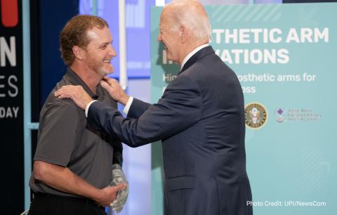 Study participant Brandon Prestwood got the chance to demonstrate for Biden the system he believes changed his life.   