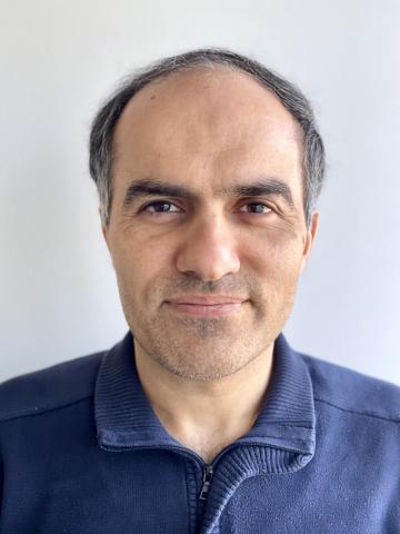 A headshot of Hossein Lavasani 