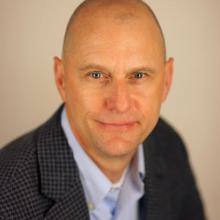 A head shot of HFI Executive Director Mark Mykleby