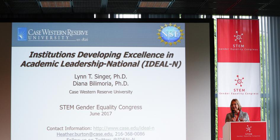 Presenter at STEM Gender Equality Congress 2017 standing in front of a slide that states "Institutions Developing Excellence in Academic Ledaership-National (IDEAL-N) Lynn T. Singer, Ph.D. Dianan Bilimoria, Ph.D. Case Western Reserve University STEM Gender Equality Congress June 2017 Contact: case/edu/ideal-n heather.burton@case.edu 216-368-0086 Follow us on Twitter: @IDEAL-N"