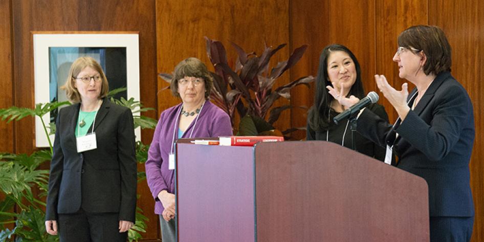 Group of women presenting at a podium during Annual Plenary 2018