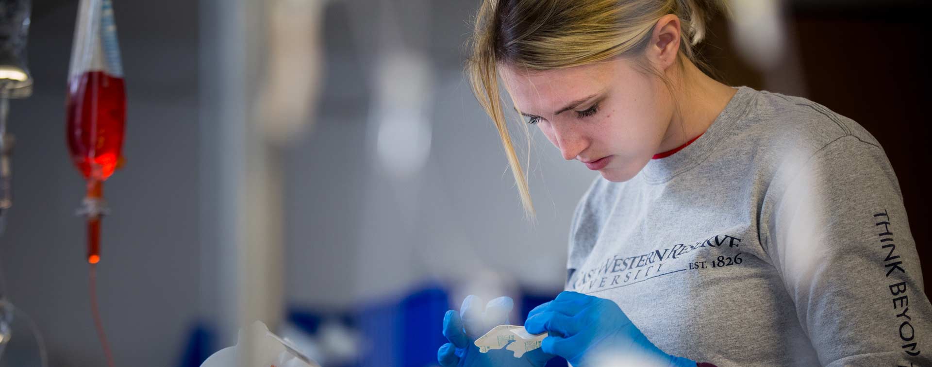 Photo of a CWRU nursing student working in a lab