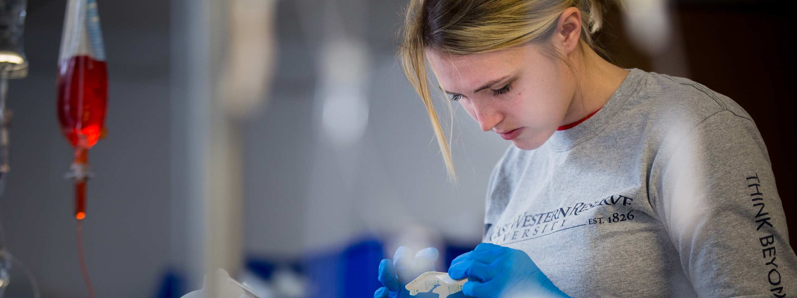 Photo of a CWRU nursing student working in a lab