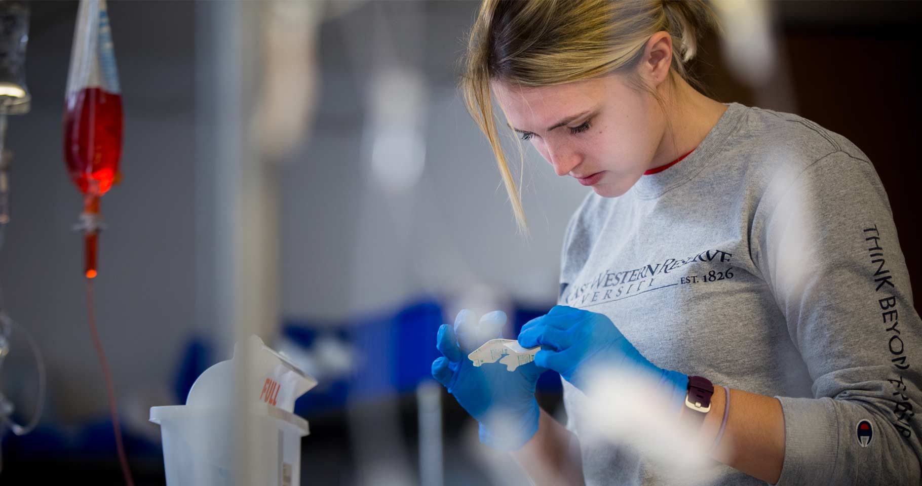Photo of a CWRU nursing student working in a lab