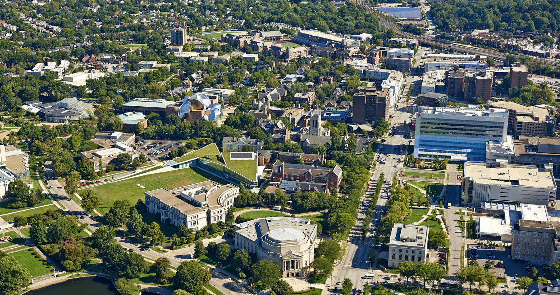Aerial photo looking down on the CWRU campus on a bright day