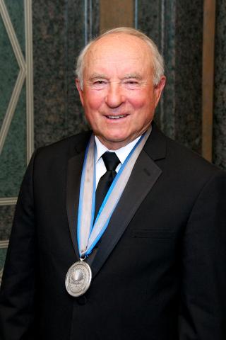 Yvon Chouinard with medal