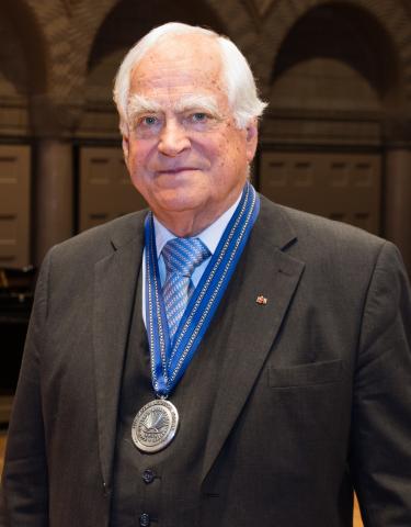 Peter Eigen with medal