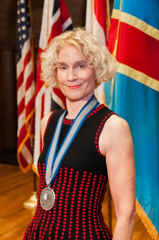 Martha C. Nussbaum with medal