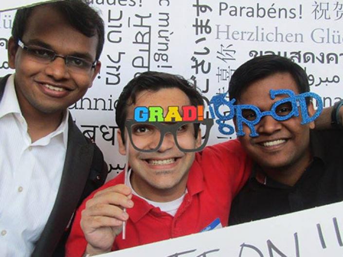 Students posing at graduation