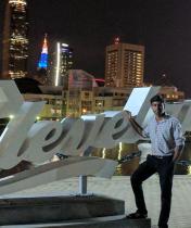 Earnest James in front of Cleveland sign.
