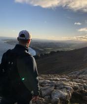 Andy looks out at a mountainside during his study abroad in Ireland