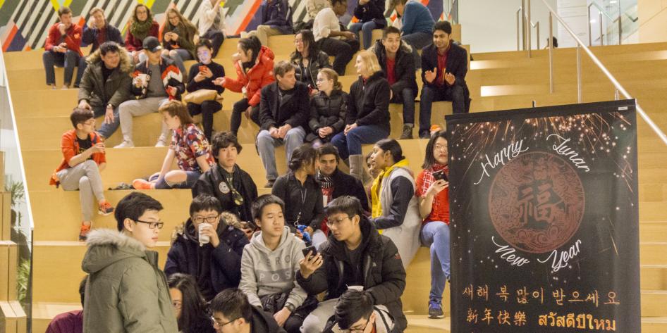Students enjoying popular Asian snacks in the Tink