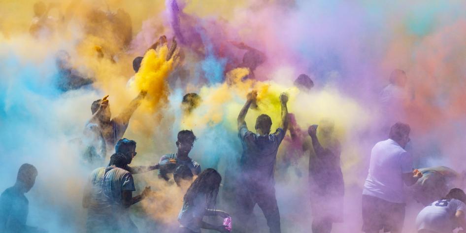 Students throwing color during Holi 2019