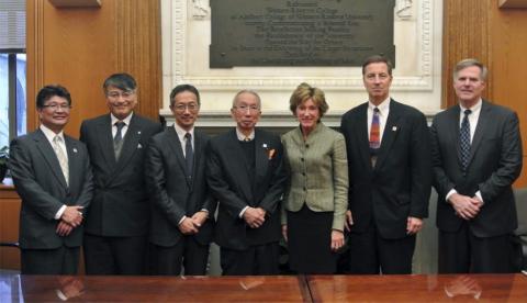 President Snyder and David Fleshler pose with visitors from Tohoku University