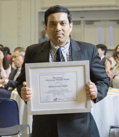 Mohammad Islam with his award