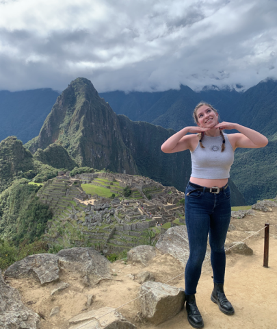 Delphine stands in front of Macchu Picchu while on her study abroad