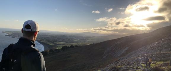 Andy looks out at a mountainside during his study abroad in Ireland