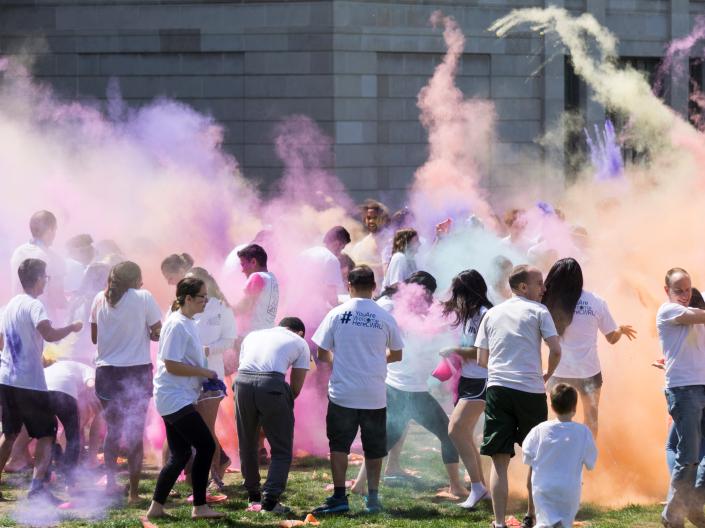 Students and community members celebrate Holi 2017