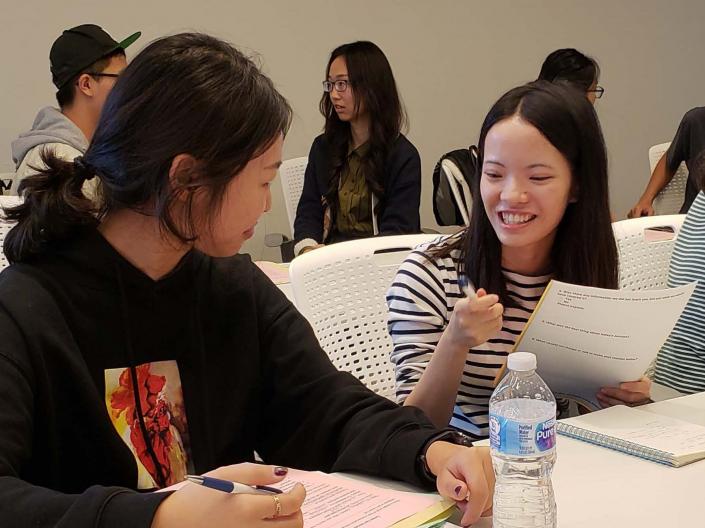 Two international students talking during an International Student Success Series event
