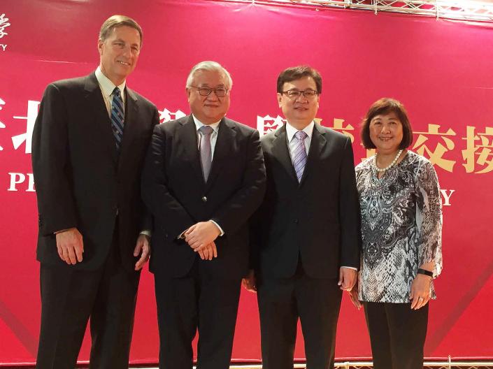 Vice Provost David Flesher stands with leaders of Taipei Medical University in Taiwan