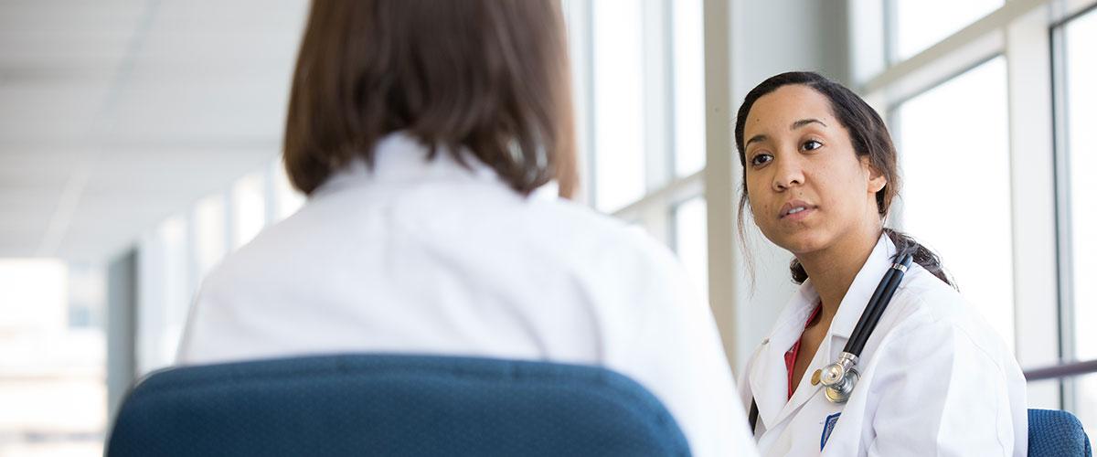 Two students talking in the hospital