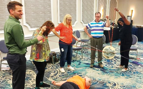 Team Members Working on a Group Challenge