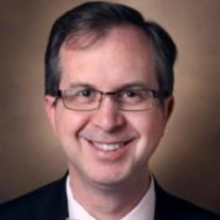 Photo of Associate Provost Tyler Reimschisel