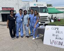 De Souza and volunteers during COVID-19 vaccine community meet-ups