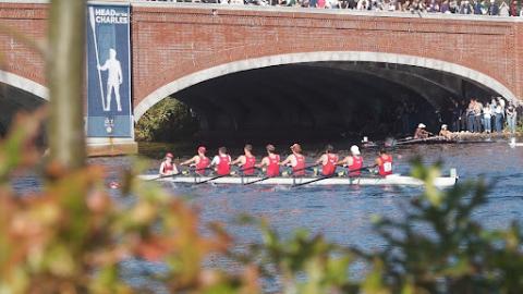 Culbert and fellow oarsmen on the water rowing