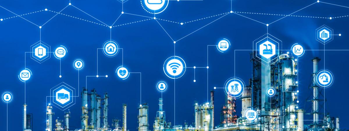 Industrial complex with IoT icons above it