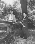 Winfred Leutner and T. Keith Glennan knock down campus fence, 1948